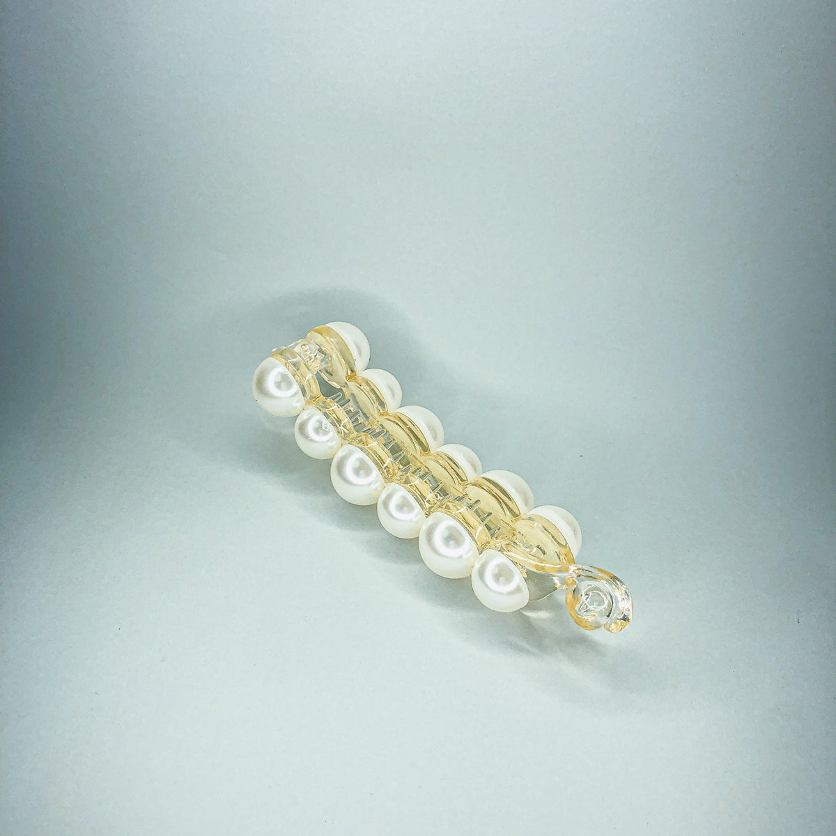 Banana Hair Grip in Pearl by Veronique