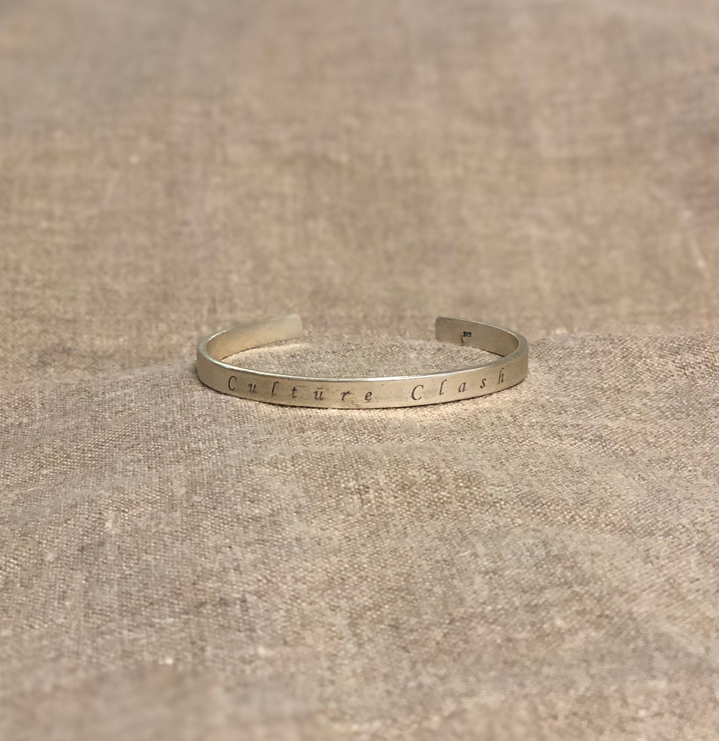 CULTURE CLASH CUFF (no image)
